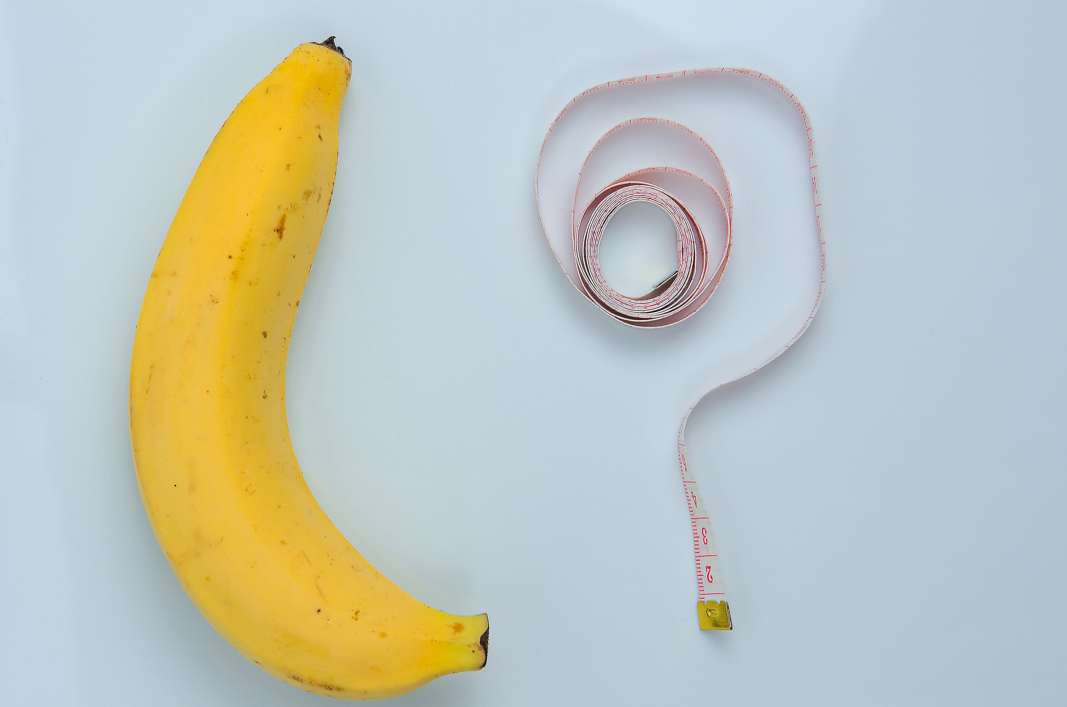 Large banana with measuring tape