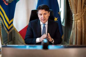 Italian prime minister at his desk on video call