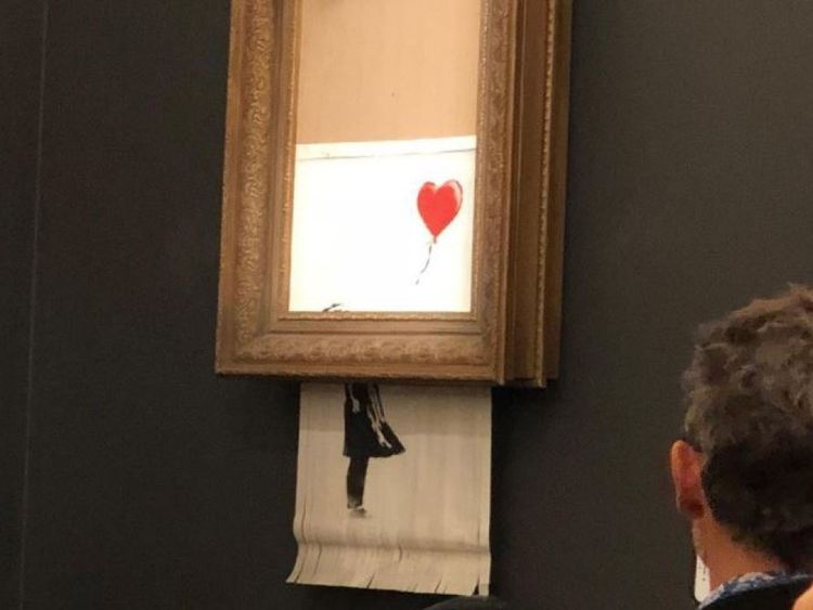 Banksy&#39;s Girl With Red Balloon mysteriously shreds after its sale at Sotheby&#39;s London. Pic: Sotheby&#39;s