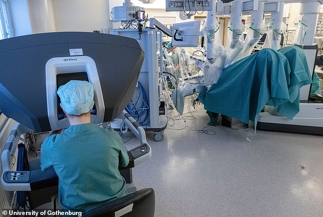 The robot can remove a donor's womb using keyhole surgery through five holes which are just 1cm wide, reducing how much blood they lose and speeding up their recovery afterwards