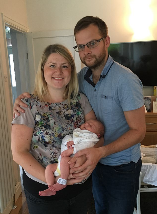 Mr Molloy, pictured with his wife and first child when he was a baby, said: 'My own birthday was 9th April and Rachel made me a card. In it she'd written: "To a fantastic Daddy. I can't wait for our next adventure as a family of four"'