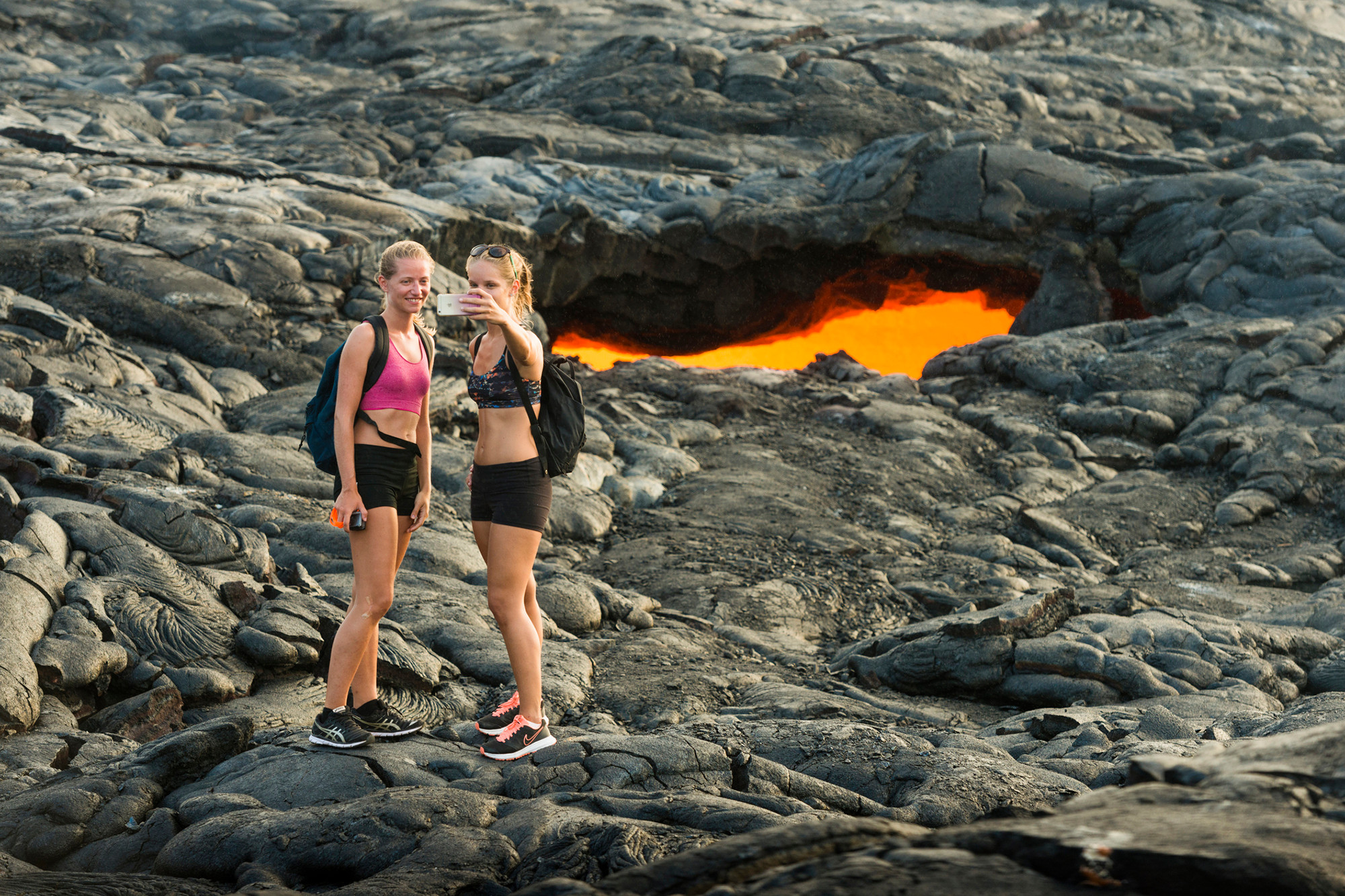 People Traveling to Volcanoes National Park Hawaii USA Taking Selfie